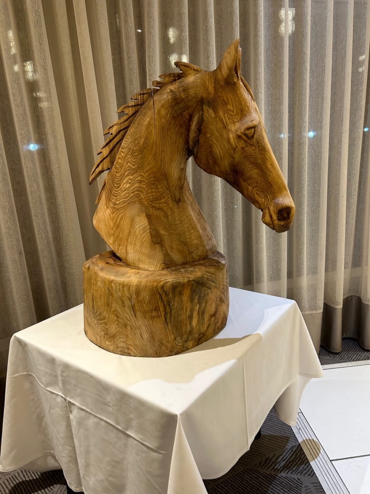 Horse’s head, carved in wood by chainsaw and auctioned in Brendan’s memory.